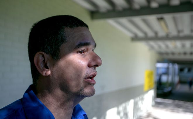 Gilberto Rivera brought his family from Puerto Rico to Florida after Hurricane Maria devastated their home. He was a teacher there and has found a job teaching history at Lake Weir Middle School. He is shown at the school on April 16. [Alan Youngblood/Ocala Star-Banner]