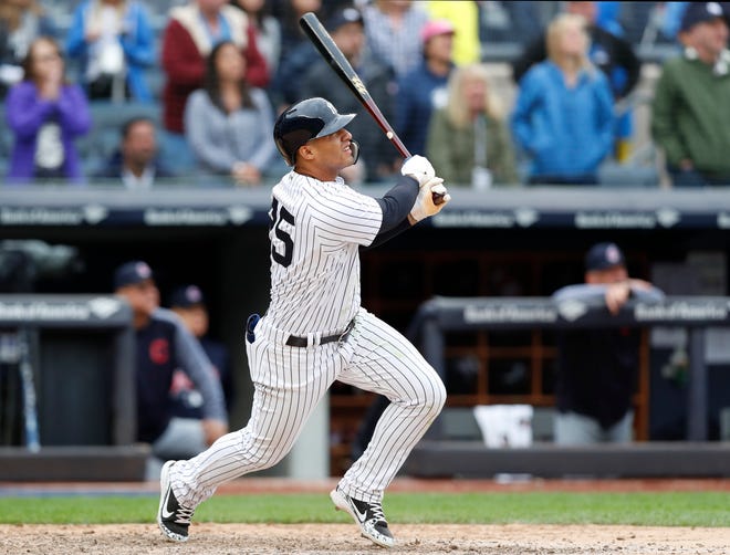 New York Yankees Gleyber Torres watches his walkoff three-run home run during a baseball game against the Cleveland Indians in New York, Sunday, May 6, 2018. (AP Photo/Kathy Willens)