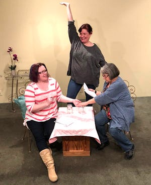 April Holgate, Lynne Scramuzza and Veronica Deisler act out a scene from Savannah Sipping Society
Contributed