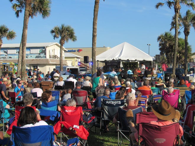 People began arriving early to Veterans Park in Flagler Beach on Friday afternoon to get a good spot for the kickoff of the inaugural three-day Flagler Songwriters Festival, which wrapped up Sunday. [News-Tribune photos/Danielle Anderson]