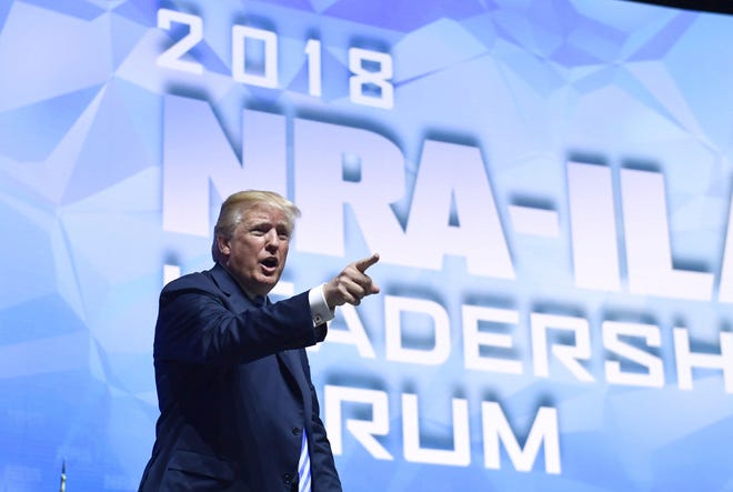 President Donald Trump speaks at the National Rifle Association annual convention Friday in Dallas. [AP Photo/Susan Walsh]