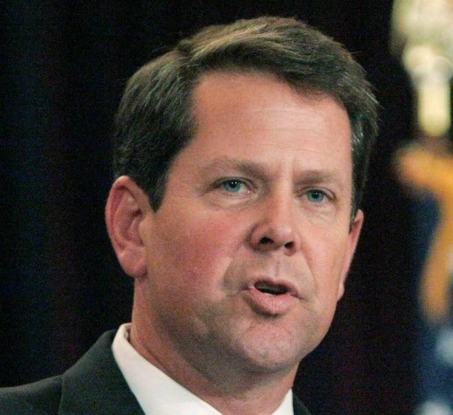 FILE - In this Nov. 2, 2010, file photo, Georgia Secretary of State Brian Kemp speaks in Atlanta. Kemp, a Georgia gubernatorial hopeful caused a stir just weeks ago with a shotgun in a campaign ad. Now he's back with a new video boasting of a pickup truck to "round up criminal illegals." Kemp calls himself a "politically incorrect conservative" in the ad released Wednesday, May 9, 2018, that appears aimed at answering — and riling up — his detractors. The Republican garnered strong criticism with an earlier campaign video released in late April in which he holds a shotgun and pretends to threaten a young man interested in his daughter. (AP Photo/John Amis, File)