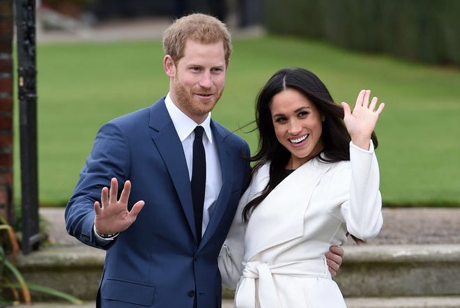 FILE - In this Nov. 27, 2017 file photo, Britain's Prince Harry and Meghan Markle pose for the media in the grounds of Kensington Palace in London, after announcing their engagement. The couple will wed on May 19. (Eddie Mulholland/Pool via AP) ORG XMIT: NYET237