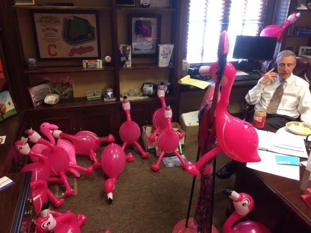 Richard Coe. chief executive officer of Portage Community Bank, gets flocked to raise funds for the Haven of Portage County homeless shelter.
