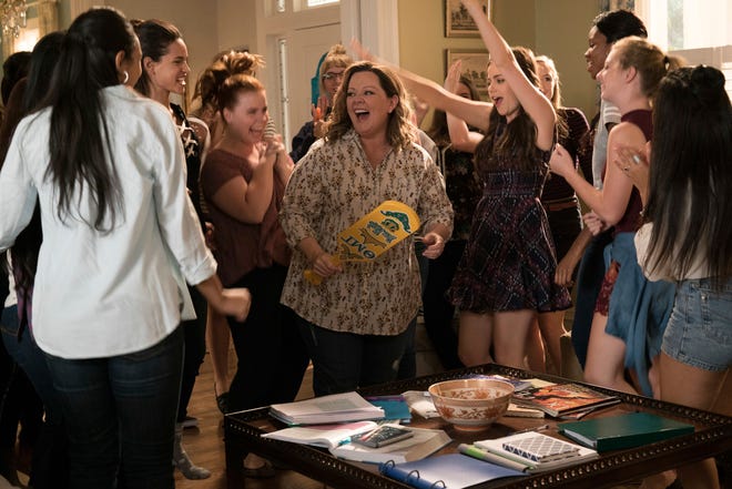 This image shows Melissa McCarthy, center, in a scene from the comedy "Life of the Party." [Warner Bros.]