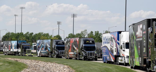 The NASCAR caravan rolls along, this weekend in Kansas. But the road ahead might have forks. [Associated Press/Orlin Wagner]