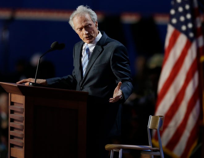 FILE - In this Aug. 30, 2012 file photo, actor and director Clint Eastwood speaks to an empty chair while addressing delegates during the Republican National Convention in Tampa, Fla. On Friday, May 11, 2018, The Associated Press has found that stories circulating on the internet that Eastwood donated a ranch and other assets to President Donald Trump's 2020 re-election are untrue. (AP Photo/Lynne Sladky, File)
