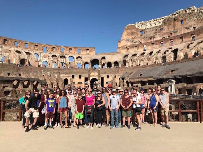 Wareham High School students gather at the Colesseum in Rome after an April school vacation trip to Italy and Greece. [COURTESY PHOTO]