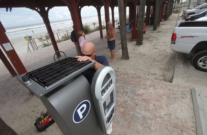 Daytona Beach Shores and Volusia County could be headed to mediation after failing to come to terms on the county's plans to develop a couple of parking lots on oceanfront land in the city. One potential compromise: using pay kiosks like those installed in New Smyrna Beach in 2015 so that the city could recoup some of the property taxes it would lose if the parcels aren't developed. [News-Journal Archives/David Tucker]