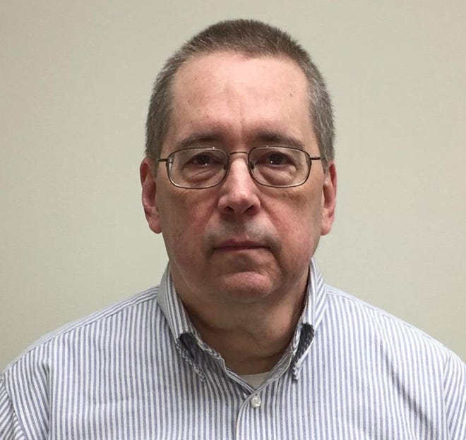 The Rev. David L. Poulson, 64, a priest in the Catholic Diocese of Erie, was charged on Tuesday with sexually abusing two boys between 2002 and 2010. He resigned as was removed from ministry in February. [CONTRIBUTED PHOTO]