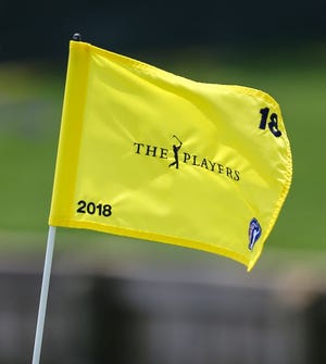 The pin flag flies at No. 18 at The Players Championship at the Stadium Course in Ponte Vedra Beach.