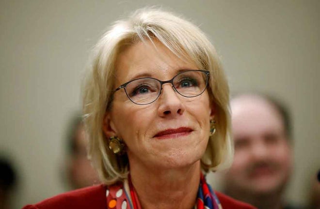 In this March 20 file photo, Education Secretary Betsy DeVos waits to testify before a House Committee on Appropriation subcommittee hearing on Capitol Hill in Washington. [ AP FILE PHOTO ]