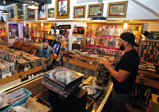 Roger Chouinard and Ted Bolduc at Purchase St. Records on Union St. in New Bedord.

[DAVID W. OLIVEIRA/STANDARD-TIMES SPECIAL/SCMG]
