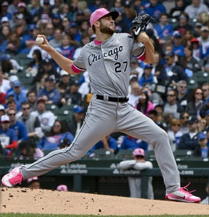 Chicago White Sox starting pitcher Lucas Giolito (27) delivers during the first inning of a baseball game against the Chicago Cubs on Sunday, May 13, 2018, in Chicago. (AP Photo/Matt Marton)