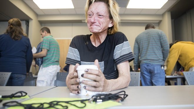Debra Jones is overcome with emotion as she arrives to take advantage of resources that could improve her life at Central Health’s Medical Access Program.