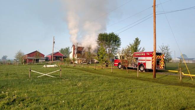 Kidron Volunteer Fire Department responded to the fire at Blue Flame Farms around 6:45 a.m. on Monday.