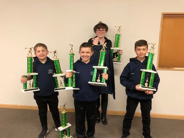 Boulevard Youth City Tournament Winners: Front: Max Limbacher (team, doubles and singles winner), Dallas Burkhart (team and doubles winner), Landon Labiche all events handicap winner. Back: Kaylie Gibson all events scratch winner. Submitted photo