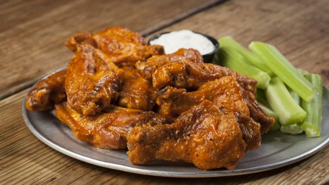 Get your fill of tasty chicken wings from a variety of local bars and restaurants at the second annual Austin Chicken Wings Festival. Contributed Melissa Skorpil