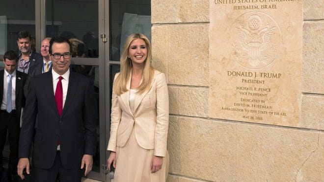 White House senior adviser Ivanka Trump and U.S. Treasury Secretary Steven Mnuchin arrive at the opening of the U.S. Embassy in Jerusalem on Monday. President Donald Trump’s administration officially transferred the ambassador’s offices to the consulate building and temporarily use it as the new U.S. Embassy in Israel. Trump in December last year recognized Jerusalem as Israel’s capital and announced an embassy move from Tel Aviv, prompting protests in the occupied Palestinian territories and several Muslim-majority countries. Lior Mizrahi/Getty Images,)