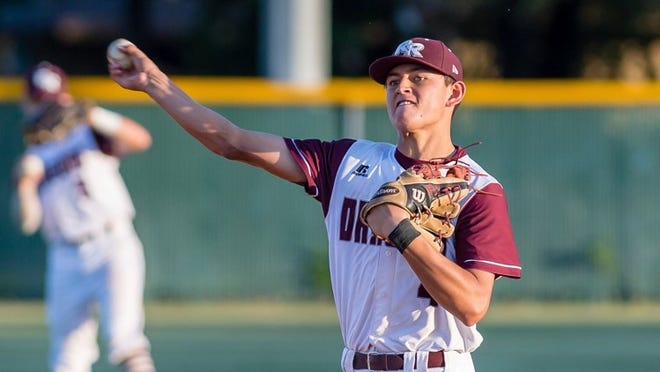 Luke Almendarez of Round Rock throws to first during warmups. Round Rock won the first game of a three-game playoff baseball series, 3-2 over Houston Memorial at Dragon Diamond in Round Rock on Thursday, May 10, 2018. Henry Huey for Round Rock Leader.