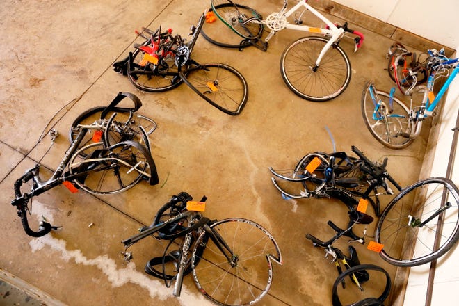 In this June 9, 2016, photo, mangled bicycles are tagged as evidence at the Michigan State Police crime lab after a pickup truck plowed into the cyclists on a rural road near Kalamazoo, Mich. [Mark Bugnaski/Kalamazoo Gazette-MLive Media Group via AP, File]