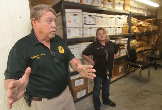Former Volusia County Sheriff's Office evidence manager Jody Thomas and April Jenkins, an evidence technician, are shown leading a tour of the aging Volusia County Sheriff's Office Evidence Facility on Dec. 8, 2017. That same day a complaint was filed against Thomas alleging harassment and a hostile work envirnoment. [News-Journal/David Tucker]