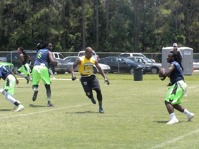 Teams square off in a flag football match at Indian Trails Sports Complex in Palm Coast. The Florida Flag Football championships are returning to Flagler County in June with the addition of a women's tournament. [News-Journal file]