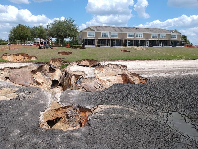 Some residents living in a section of Fore Ranch were forced to leave their homes in late April after sinkholes opened up near their townhomes. [Doug Engle/Ocala Star-Banner]2018