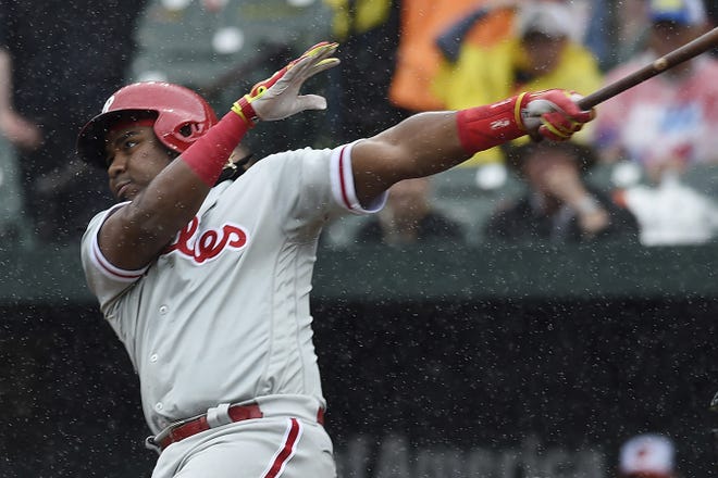 Philadelphia Phillies' Maikel Franco follows through on a RBI single against the Baltimore Orioles in the sixth inning of baseball game on Wednesday in Baltimore. [AP PHOTO/GAIL BURTON]