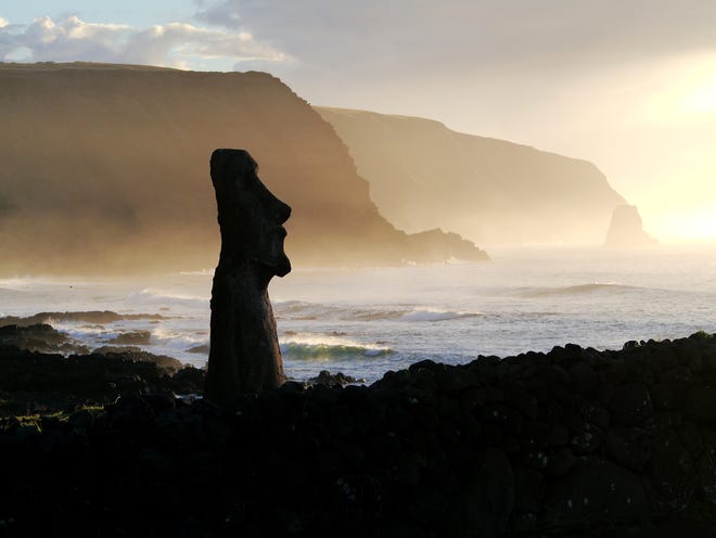 One of Easter Island's moai greets the sunrise. [COURTESY OF KEN YELLIS]