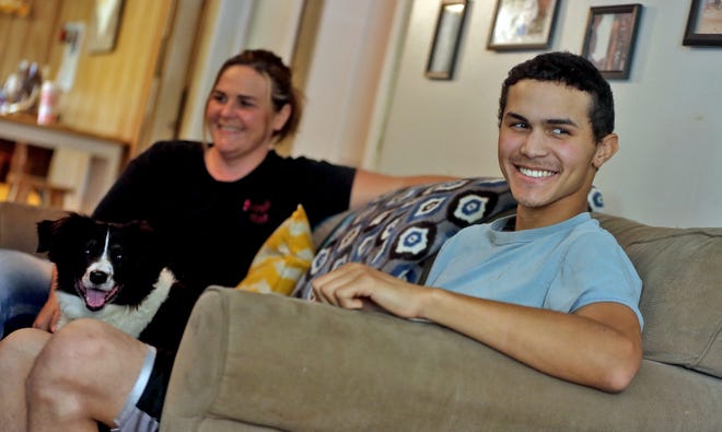 Elijah Lankford enjoys time at home after spending two weeks in the hospital recovering from bull riding injuries. [Brittany Randolph/The Star]