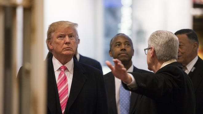 President Donald Trump and Ben Carson, the secretary of Housing and Urban Development, tour the Mississippi Civil Rights Museum in Jackson in December.