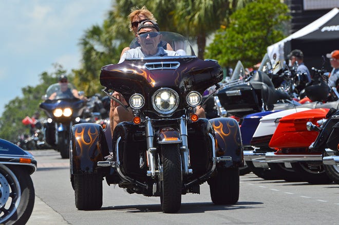 Motorcycles roll down Main Street during the 22nd Annual Leesburg Bikefest on Friday, April 27, 2018. [Whitney Lehnecker/Daily Commercial]