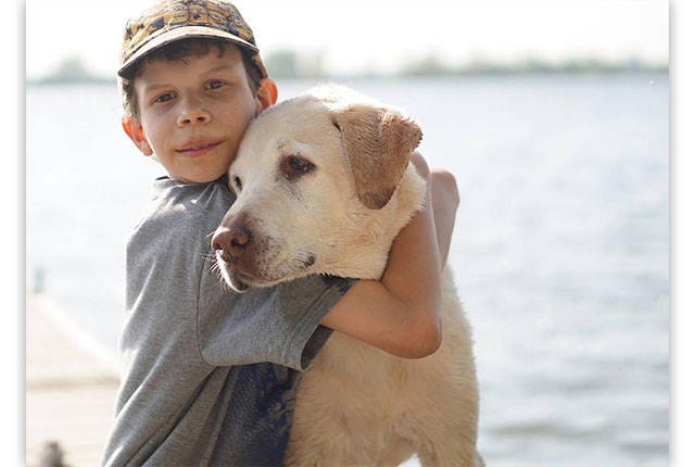 BEST FRIENDS  — Children can be especially affected by the loss of a pet. Being honest with them, providing emotional support and holding a memorial service for your pet can help kids cope. (Contributed)