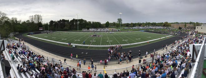 Fans file in, just prior to Friday's opening kickoff of Game On! between host Holland Christian and West Ottawa. [Chris Zadorozny/Sentinel staff]
