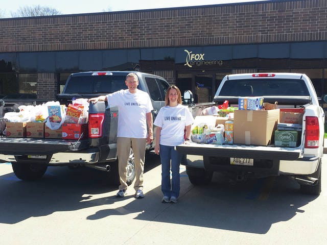 Art Barton and Lisa Packer collect donations at Fox Engineering for the 2018 LIVE UNITED Food Drive. Contributed photo
