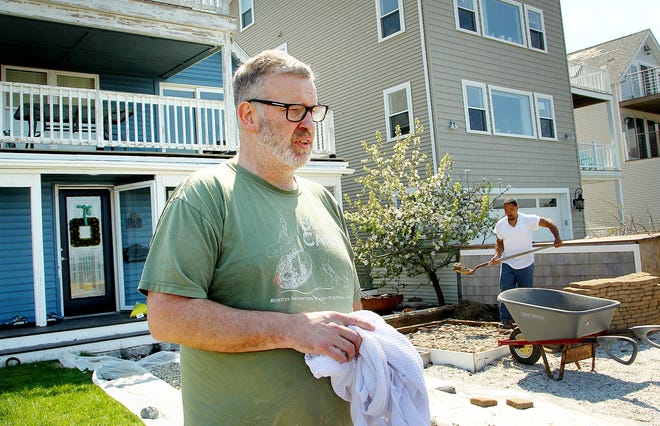 Post Island Road resident John Scaife discusses how recovery in his neighborhood is going since a powerful Nor'easter flooded the area, Thursday, May 10, 2018. Gary Higgins/The Patriot Ledger
