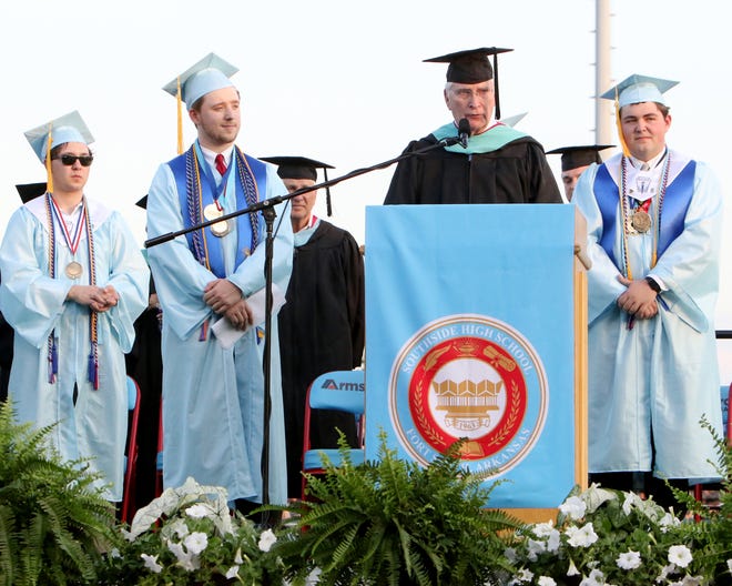 Southside High School Principal Wayne Haver thanks the graduating class of 2018 for the class gift presented to the school Friday, May 18, 2018, during the 53rd annual commencement at Jim Rowland Stadium. [JAMIE MITCHELL/TIMES RECORD]