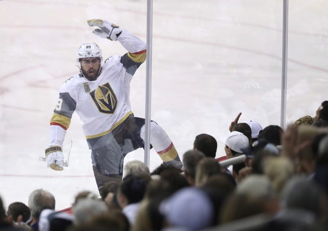Vegas Golden Knights' Alex Tuch (89) celebrates after scoring during first period NHL Western Conference Finals game 5 hockey action against the Winnipeg Jets, in Winnipeg, Sunday, May 20, 2018. (Trevor Hagan/The Canadian Press via AP)