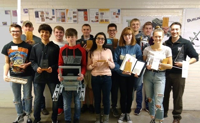 Burlington High School students in the school's Technology Student Association along with chapter advisor Scott Thorne, far right, are shown April 12 with the many state TSA competition awards they recieved April 10 in the industrial technology building at the high school. [contributed]