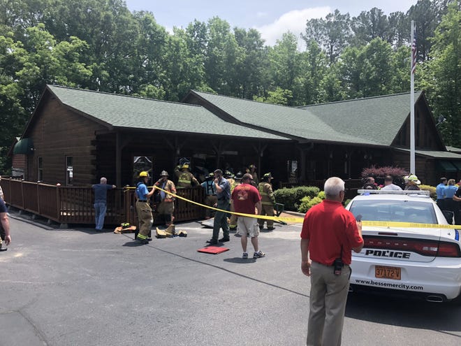 Police say a car was driven into the Surf and Turf Lodge in Bessemer City during the lunch hour on Sunday. Roger Self, a prominent local businessman and private investigator, was arrested at the scene and will face two charges of first-degree murder. [KEVIN ELLIS/THE GASTON GAZETTE]