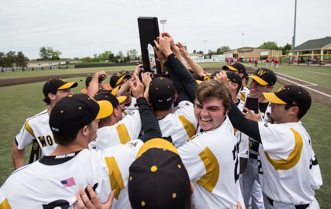 The College of Wooster baseball team hoists the Mideast Regional championship trophy it won Monday in Adrian, Mich., with a 4-2 win over Wabash. Now 40-8, the Fighting Scots move on to the Div. III World Series for the sixth time in school history, starting Friday in Appleton, Wisc.