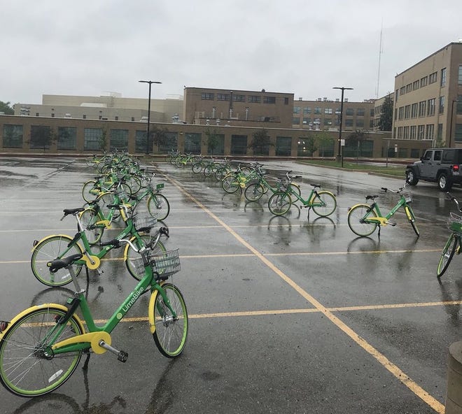 East High School seniors brought dozens of LimeBikes to the school early Monday, May 21, 2018, for a senior prank. Matthew Bennett, an assistant principal at the school, shared this photo via Twitter. [PHOTO PROVIDED]