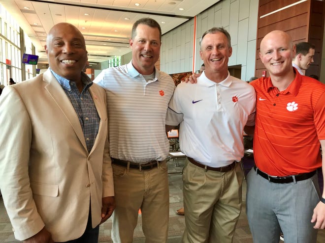 Former Douglas Byrd High football star Donnell Woolford (far left) with with Bill Spiers, Mark Davidson and Terrence Oglesby, all of whom returned to Clemson after their playings to earn degrees last week. {Photo courtesy of Scott Keepfer of The Greenville (S.C.) News}