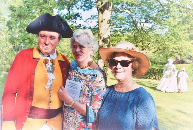 Paul O’Shaunessy, Kate Wharton and Nancy Nelson get ready for the Buttrick Garden Party. [Courtesy photo]