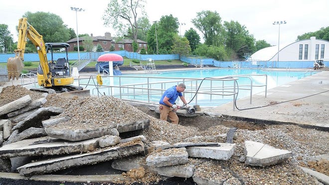 The opening of the Cambridge City Pool this weekend may be delayed a couple of days due to a six-inch plastic coupling on an underground water line broke. That line supplies water to the slide and pool fountains. Jerry Cowden of JerCo had the break fixed Tuesday morning after two days of sawing up three concrete areas to locate it. The holes will now have to be filled in and have new concrete pool deck poured. After that, the pool chemicals will be added and the water stabilized before opening. Check the Cambridge City Pool Facebook page for updates on opening.