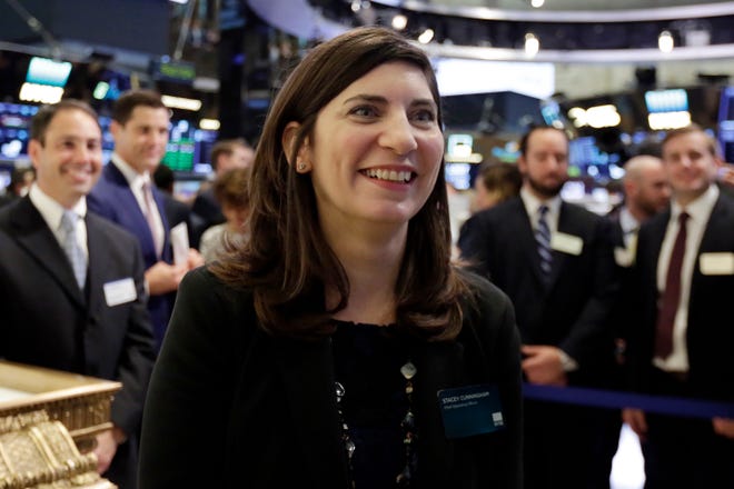 Stacey Cunningham, the current New York Stock Exchange COO, who will become the exchange's 67th president, visits the floor of the NYSE, Tuesday, May 22, 2018. Cunningham will become the first female leader in the history of the 226-year-old exchange. (AP Photo/Richard Drew)