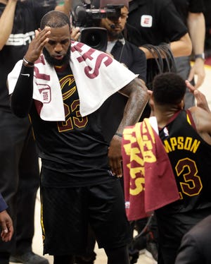 Cleveland Cavaliers' LeBron James (23) celebrates with Tristan Thompson after a 111-102 victory over the Boston Celtics in Game 4 of the NBA basketball Eastern Conference finals, Monday, May 21, 2018, in Cleveland. (AP Photo/Tony Dejak)