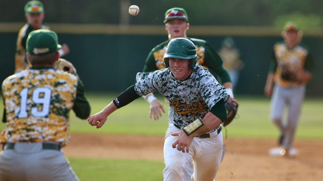 John Kyle Mitchell races the ball to first during a rundown with A.C. Reynolds’ Josh Dotson and Jordan Pendley during the Western N.C. 3A Championship series at Crest High School on Wednesday. [Brittany Randolph/The Star]