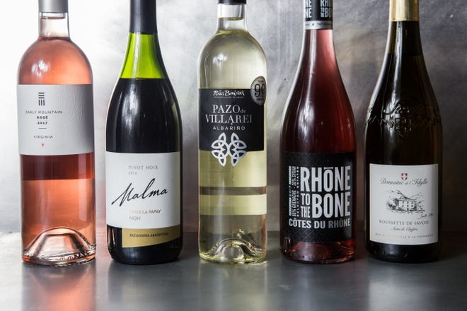 Picks for this week include a delicious pink from Virginia, a pinot noir from Patagonia, a Spanish Albarino destined for seafood, a kitschy label from southern France and an obscure white from the French Alps. [Photo by Jennifer Chase for The Washington Post]